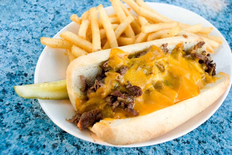 Scottish philly cheesesteak with deep fried french fries. Scottish philly cheesesteak with deep fried french fries.