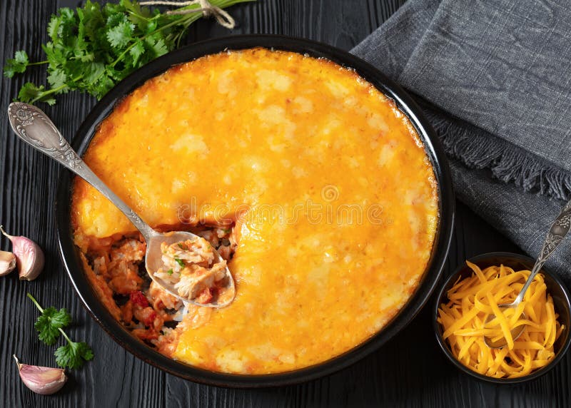 Cheesy Chicken Rice Salsa Casserole in Baking Dish Stock Image - Image