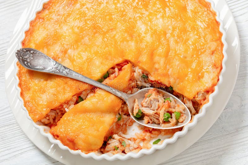 Cheesy Chicken Rice Salsa Casserole in Baking Dish Stock Image - Image