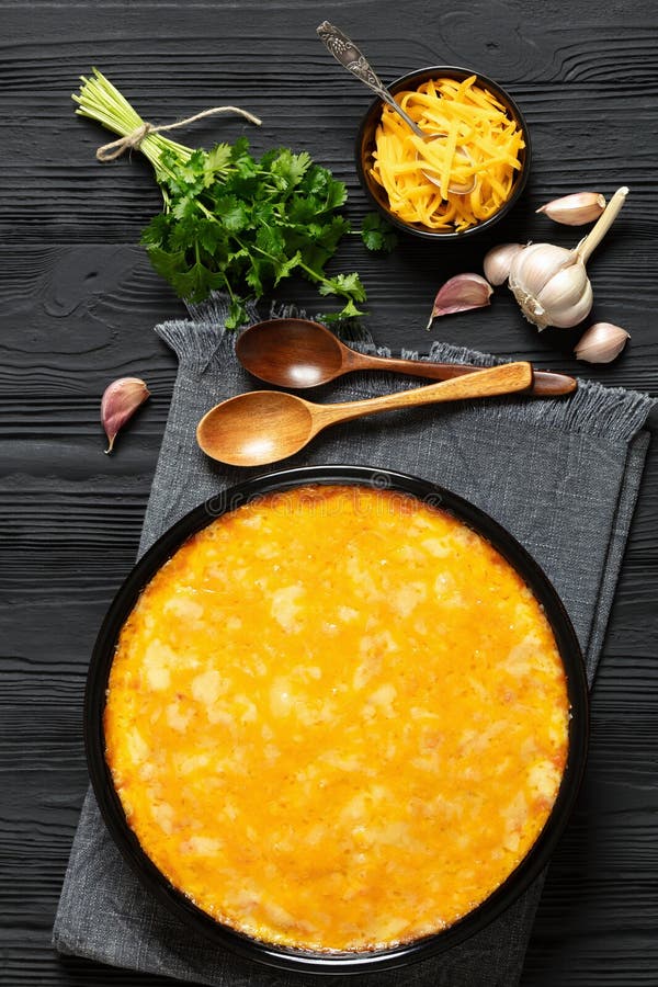 Cheesy Chicken Rice Salsa Casserole in Baking Dish Stock Image - Image