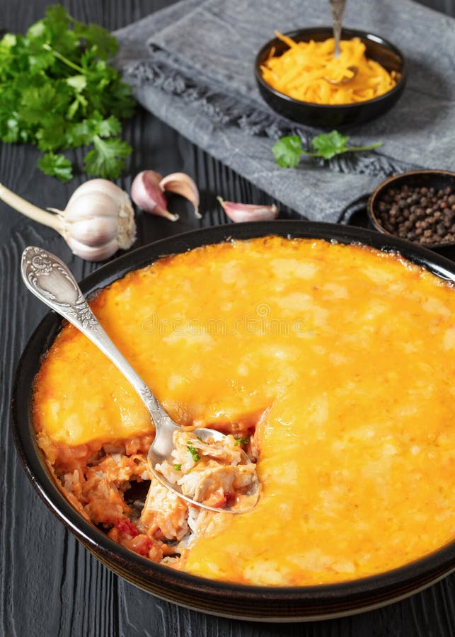 Cheesy Chicken Rice Salsa Casserole in Baking Dish Stock Image - Image