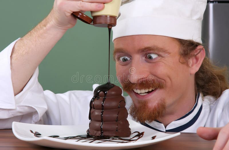 Chef added chocolate sauce at piece of cake