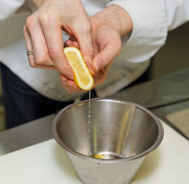 Chef is Adding Lemon Juice in Sauce Stock Photo Image of adding
