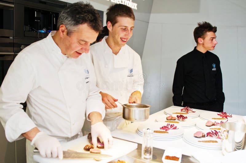 Chef Andrea Canton and his sous chefs stock photography Chef Andrea Canton and his sous chefs stock photography