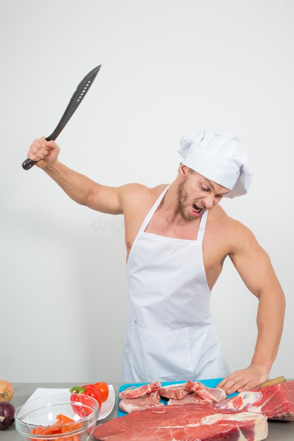 Chef Bodybuilder Preparing Large Chunks of Raw Meat. Natural Proteins