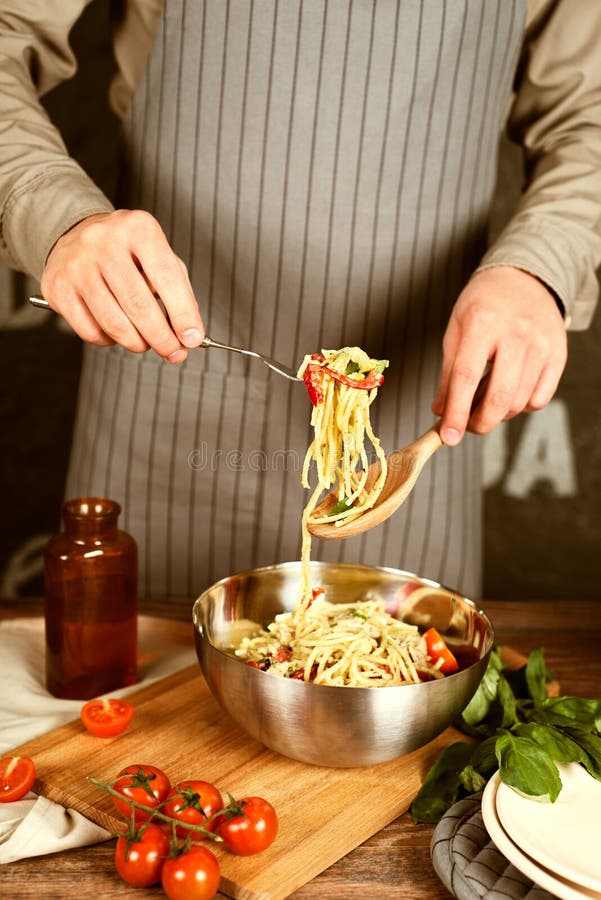 Chef Cook Holding Pasta on a Fork Stock Image Image of break, chef