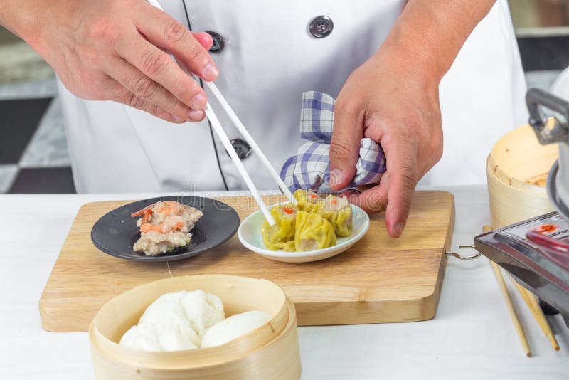 Chef cooking chinese food name din sum in the restaurant. Dimsum restaurant stock images, royalty-free photos and pictures