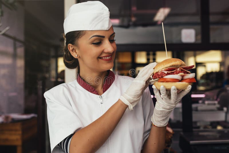 Chef Cooking and Decorated Hamburger. Stock Image Image of chef