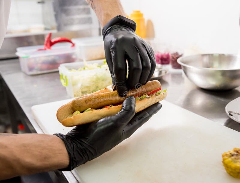 The Chef Cooking Hot Dog on a Grill. Restaurant Stock Photo Image of