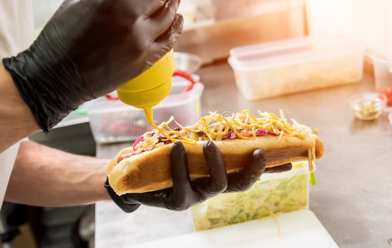 The Chef Cooking Hot Dog on a Grill. Restaurant Stock Photo Image of