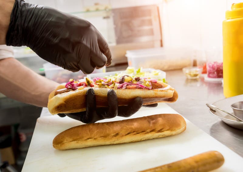 The Chef Cooking Hot Dog on a Grill. Restaurant. Stock Image Image of