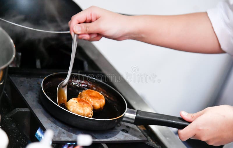 Chef Cooking, Chef Preparing Food in the Kitchen, Chef Decorating Dish