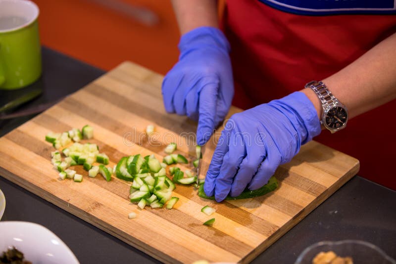 Chef cut the cucumbers stock image. Image of tasty, cucumbers - 205296319