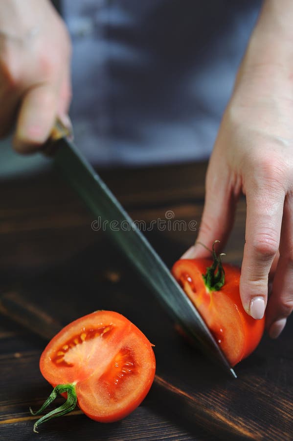 Chef Cuts with a Knife a Tomato Closeup Stock Image Image of housewife, chopped 141575173