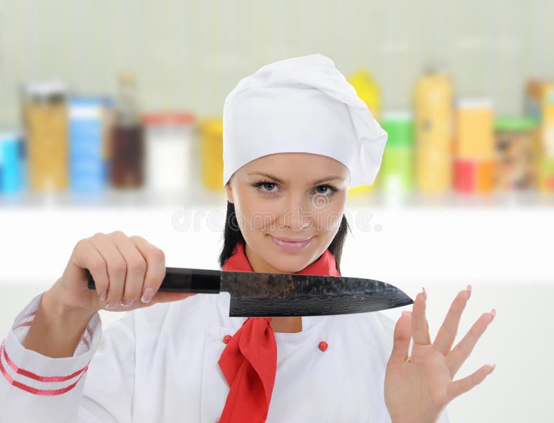 Chef cuts the tomato