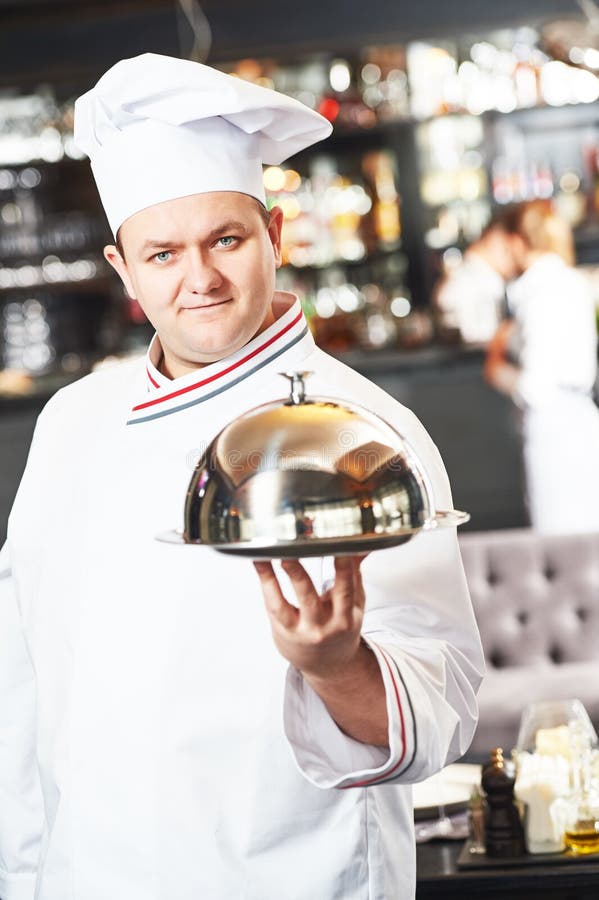 Chef De Cuisinier Au Restaurant Photo stock Image du heureux