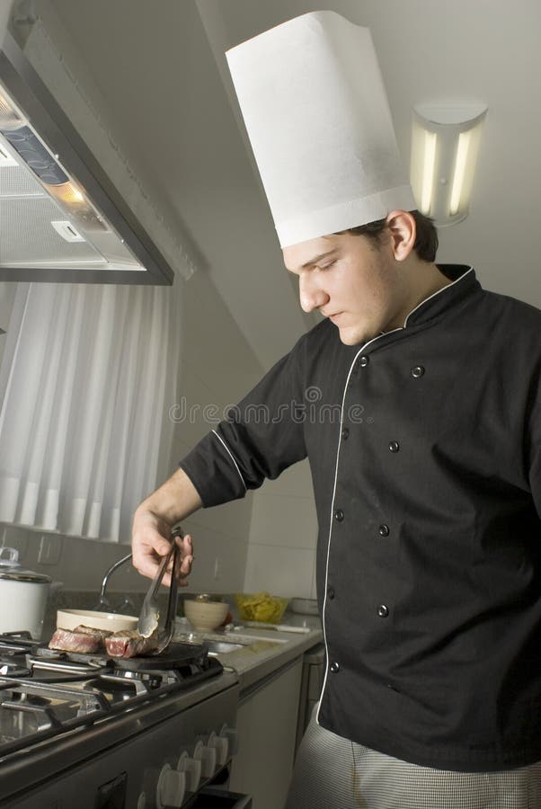 Chef Grilling Steaks