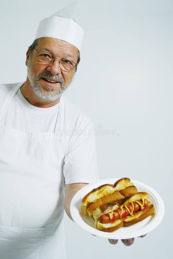Chef with hot dogs stock photo. Image of dinner, frankfurters 4074252