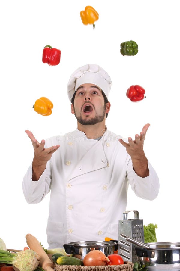 Chef juggling with peppers