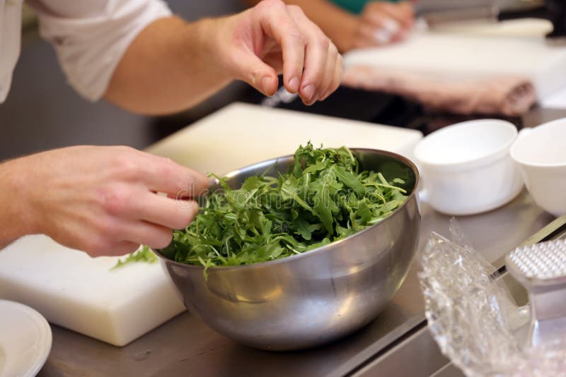 Chef is mixing the greens royalty free stock photos