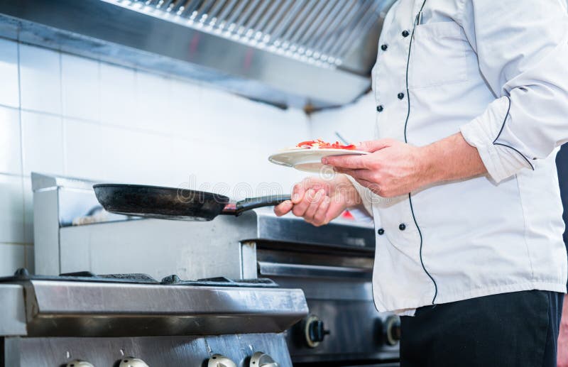 Chef with Pan in Restaurant Kitchen Stock Image Image of people