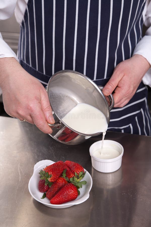 Chef pouring milk stock image. Image of health, cook 17055383