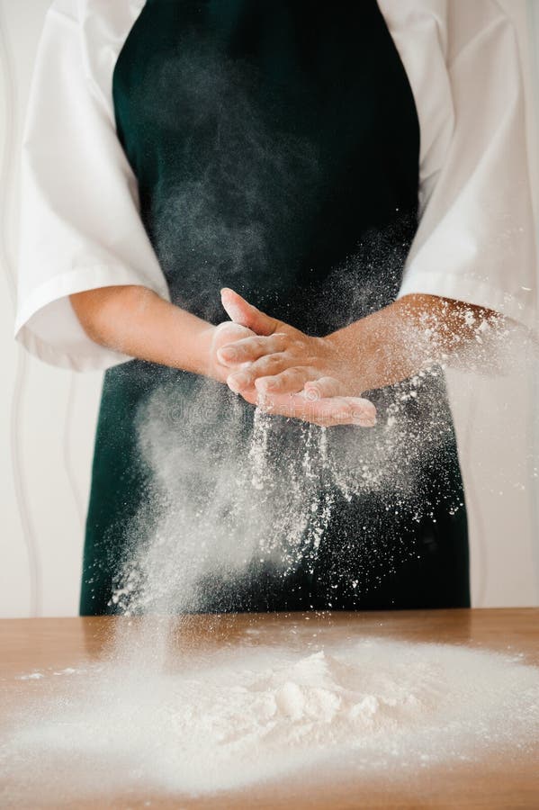 The Chef Prepares the Dough the Process of Making Dough in the Kitchen Stock Photo Image of