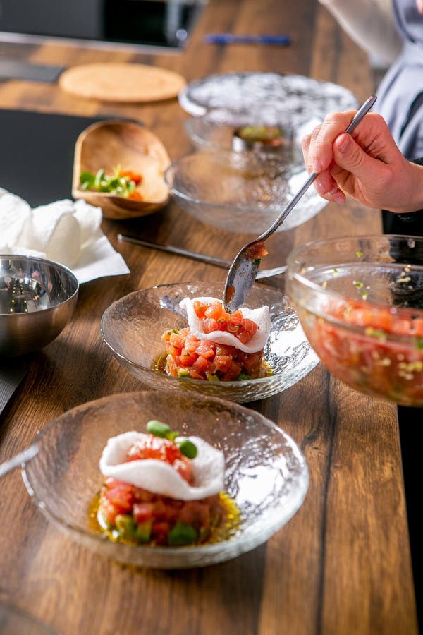 Chef Puts Tuna Tartare on a Plate. Master Class in the Kitchen. the