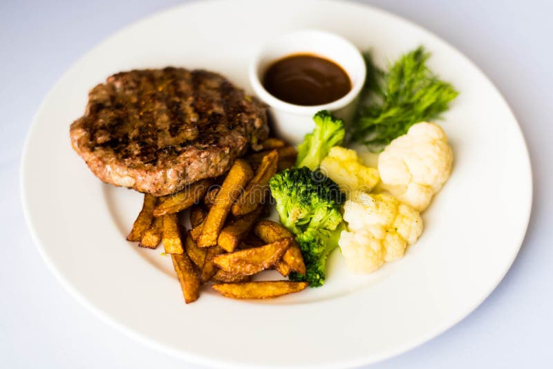 Chef S Specialty Presented in Restaurant on Served Table Stock Image