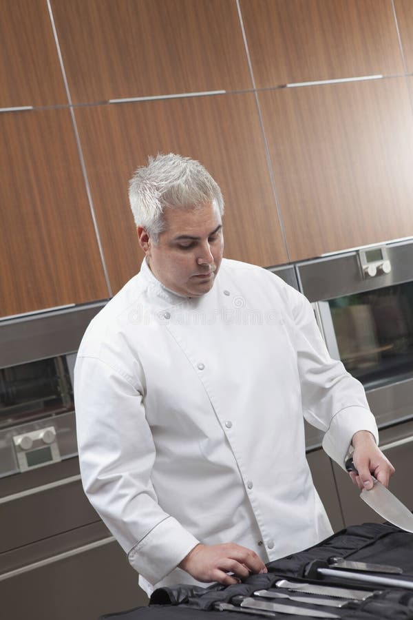Chef Selecting Knife Out of Full Set Stock Photo Image of chefs
