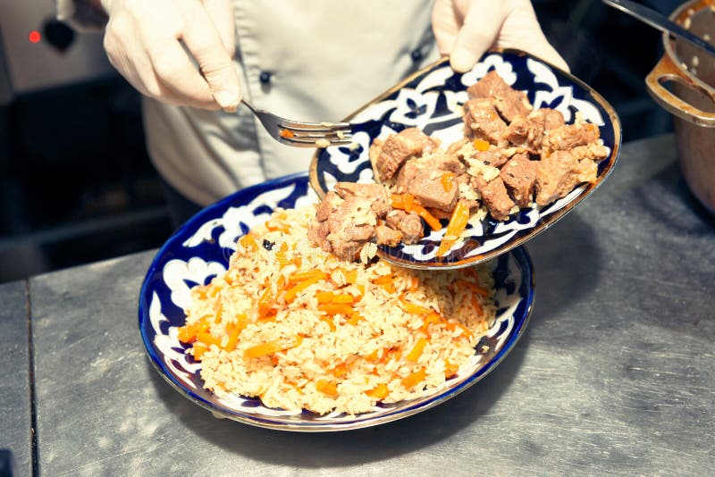 Chef is Serving Pilaf in Restaurant Kitchen Stock Photo Image of garlic, fried 133789444