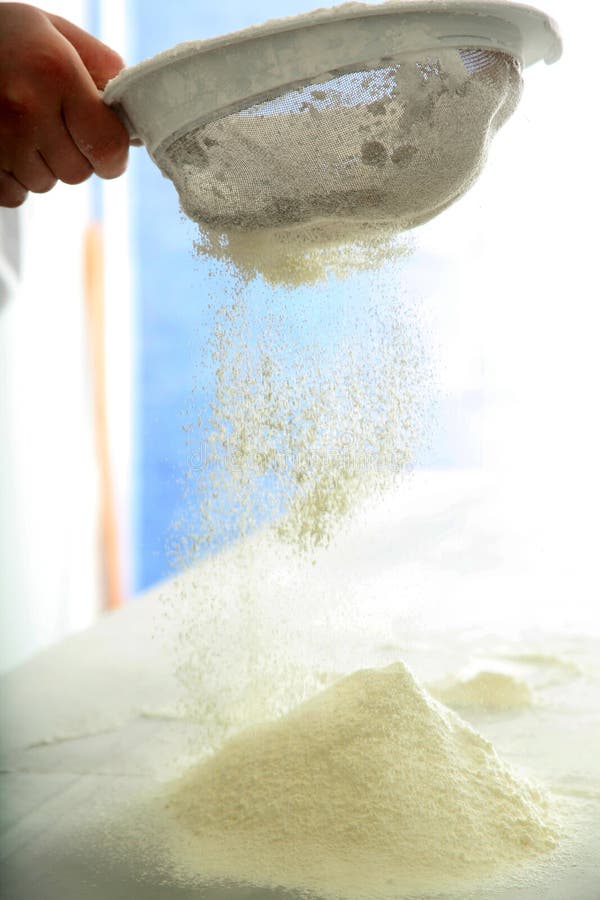 Chef sifting flour stock image. Image of human, homemade 195155849