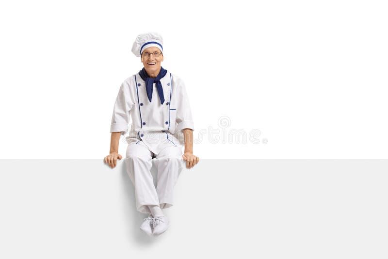 Chef sitting on a panel and smiling