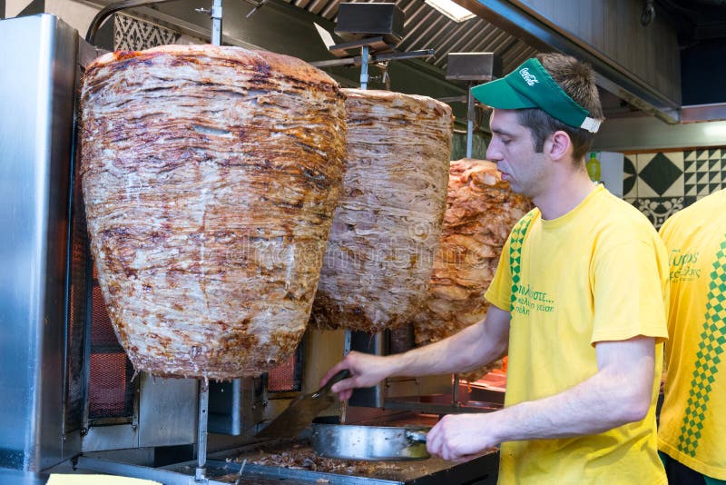Chef slicing Gyros Greek fast food royalty free stock photos Chef slicing Gyros Greek fast food royalty free stock photos