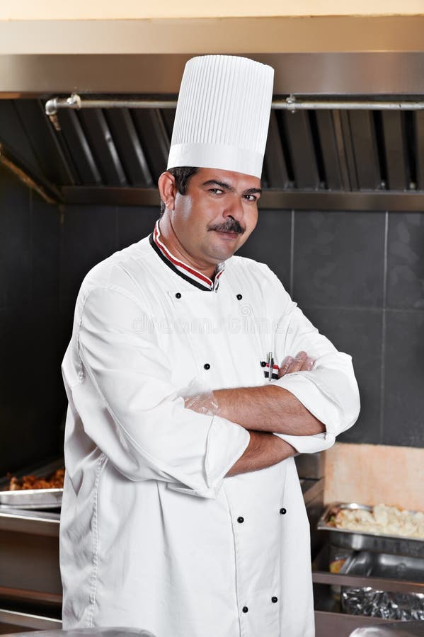 Chef in uniform at kitchen stock image. Image of chef 21053007