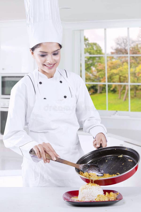 Chef Woman Cooking in The Kitchen