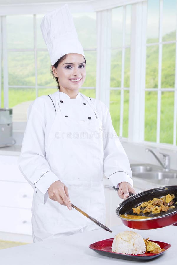 Chef Woman Preparing Lunch royalty free stock photography Chef Woman Preparing Lunch royalty free stock photography