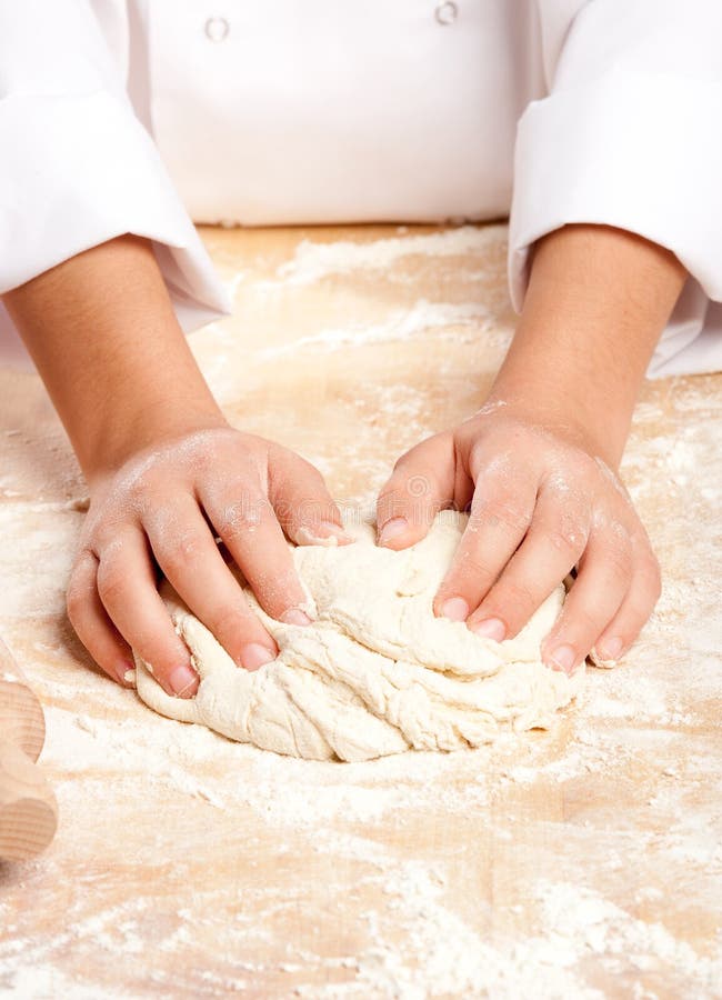 Chef working the dough stock image