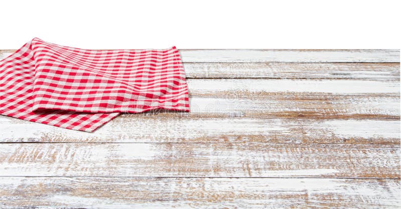 Chekered tablecloth on empty table isolated on white background copy space.
