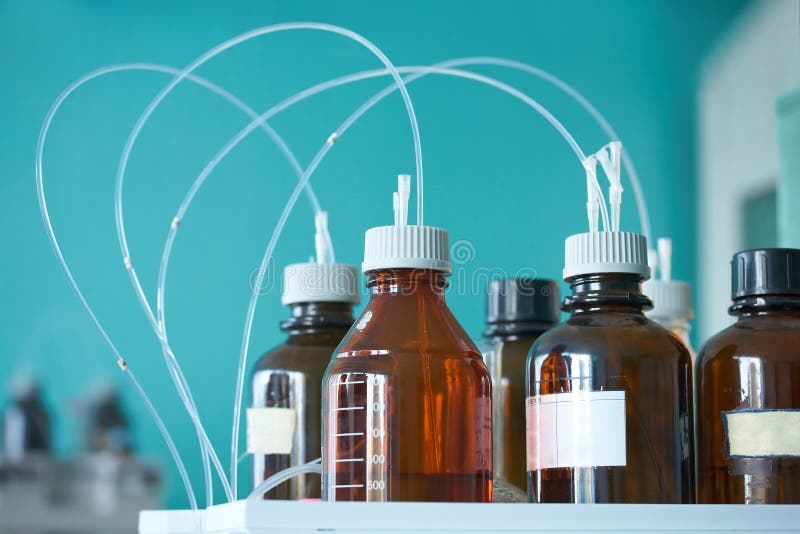 Chemical bottles stock photo. Image of blue, flask, analyzing 23361270