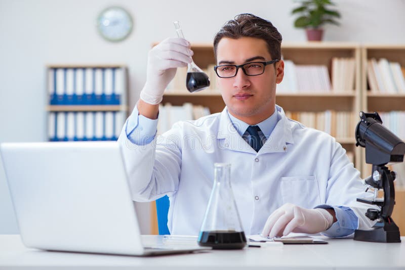 The Chemical Engineer Working on Oil Samples in Lab Stock Image Image
