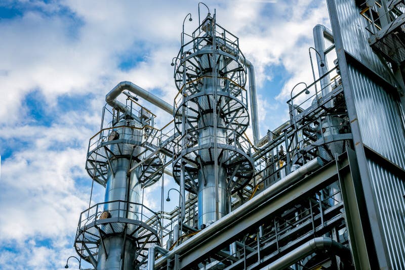 Chemical factory. Rectification towers royalty free stock photography
