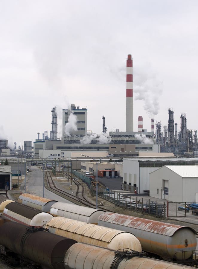 Chemical factory and trains stock image