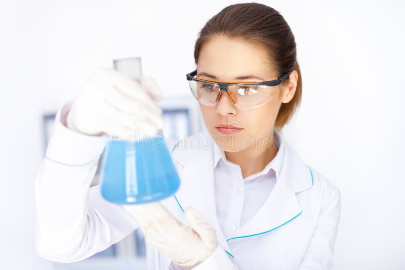 Chemical female researcher in laboratory