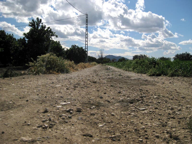 Chemin de terre pierreux photo libre de droits Chemin de terre pierreux photo libre de droits