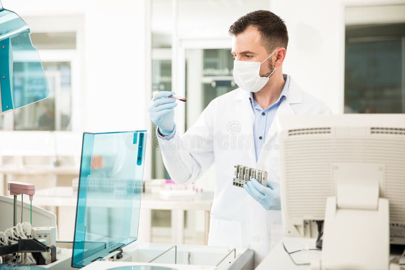 Chemist Analyzing Blood in a Lab Stock Photo Image of analysis
