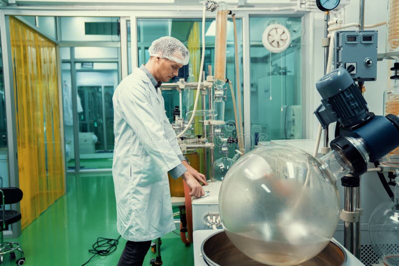 Apothecary extract using cannabis extraction machine in laboratory.