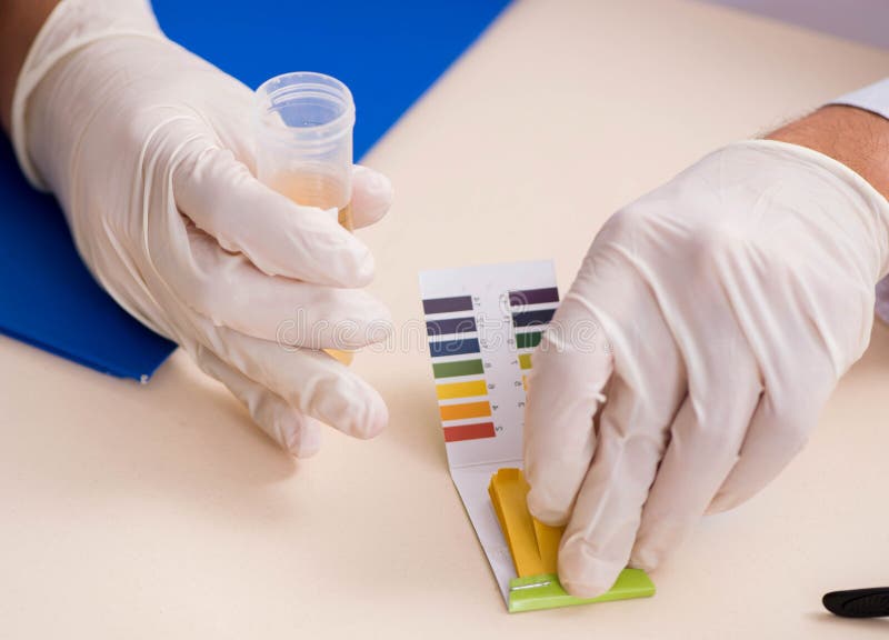 Chemist in the Lab Checking with Ph Strips Stock Photo Image of