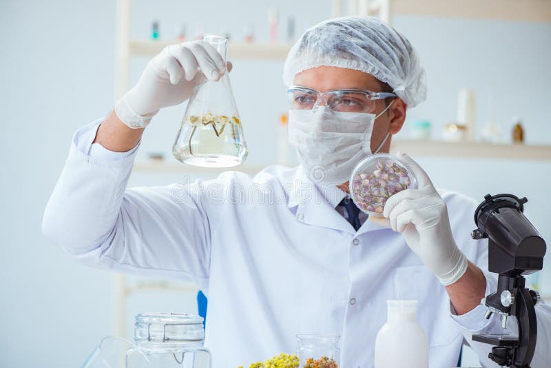 The Chemist Mixing Perfumes in the Lab Stock Photo Image of aroma, natural 99859244