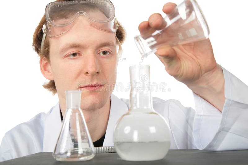 Chemist pours liquid in flask